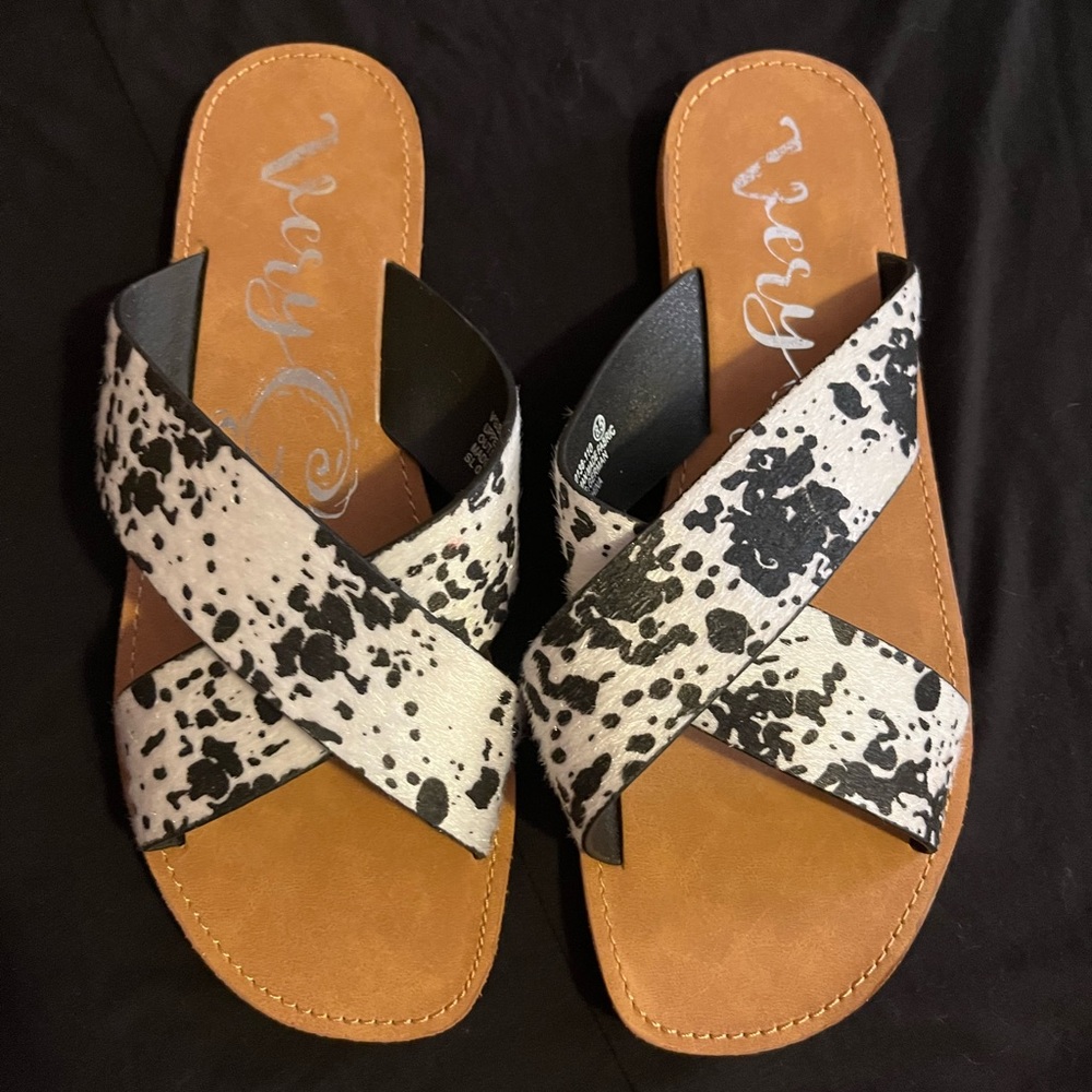 Brand new cow print flip flops